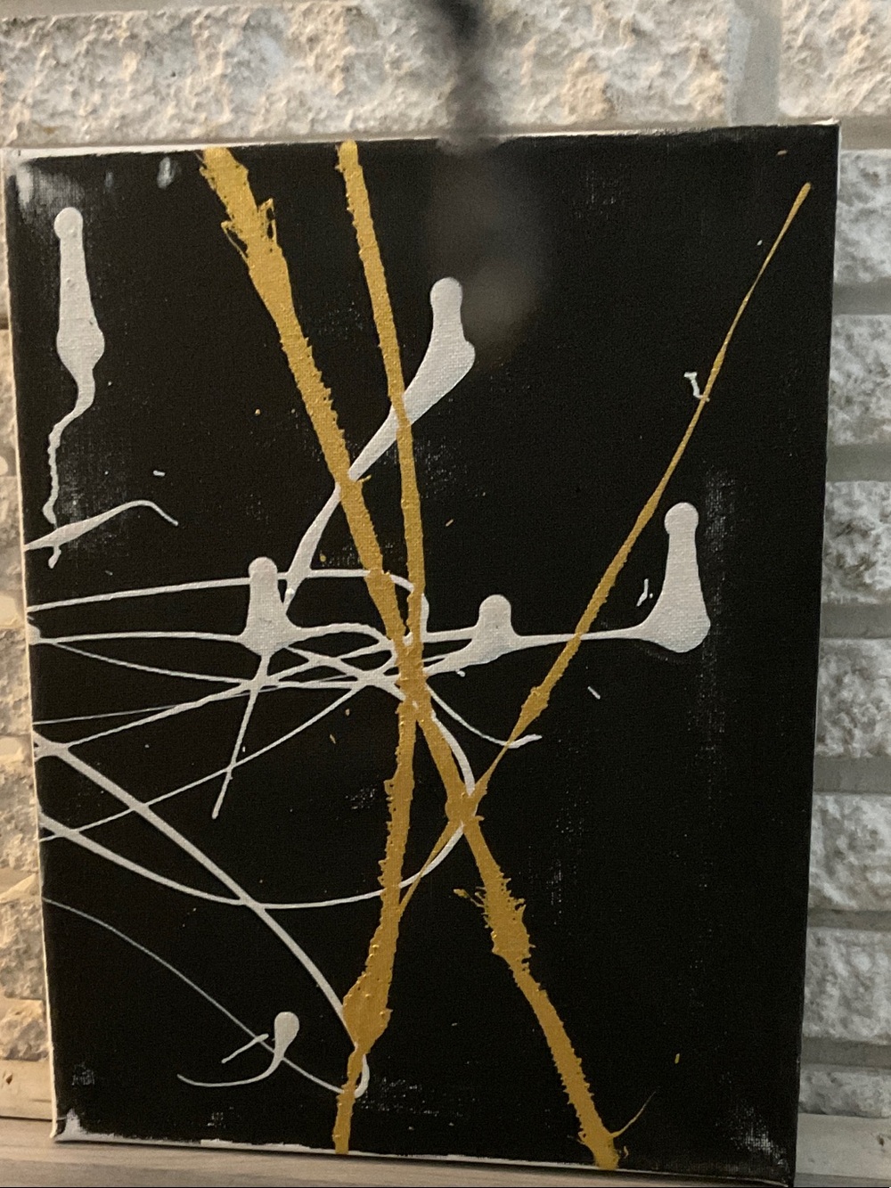 Abstract Black Canvas Wall Art with Gold and White Accents
